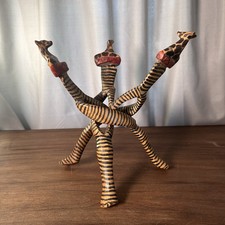 Treppiede in legno intagliato