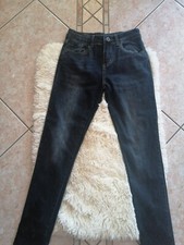 Jeans scuro donna con ricami alle caviglie