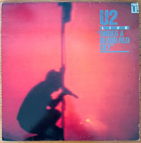 Live under a blood red - -,
