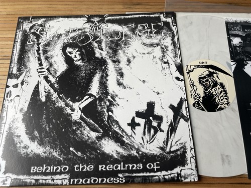 Sacrilege behind the realms - sacrilege,