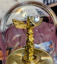 Raro totem in argento dorato