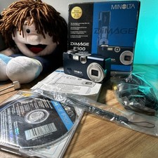 Rara fotocamera digitale compatta MINOLTA Dimage F100 4MP blu indaco da collezione