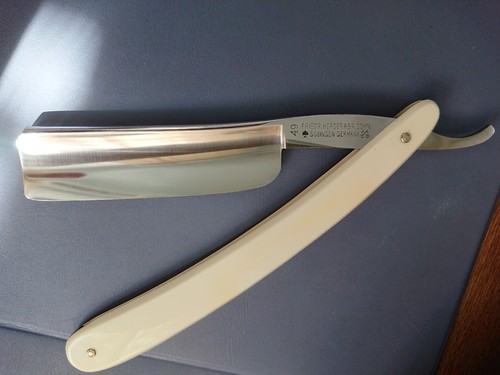 Antico rasoio dritto vintage