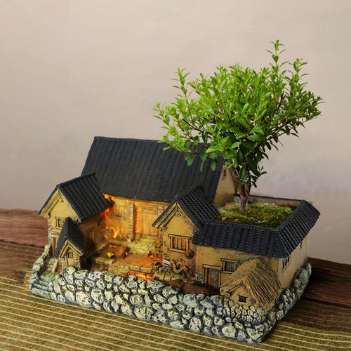 Case miniatura scultura - in,
