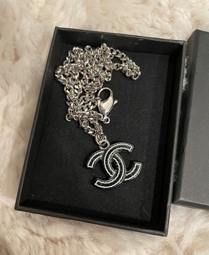 Chanel black resin - cc,