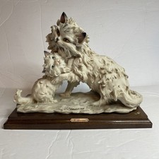 Statuina Giuseppe Armani