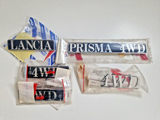 LANCIA PRISMA 4WD SET SCRITTE COMPLETO NOS EMBLEM SET ORIGINAL