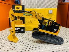 Escavatore Caterpillar Cat