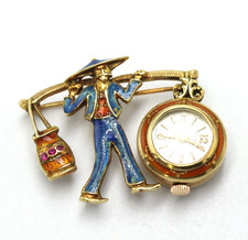 Spilla orologio con - -, smalti