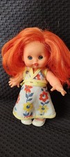 Tina Minifurga capelli rossi