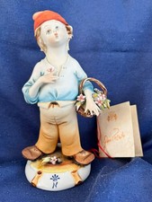 Statuetta Capodimonte Gino Pezzato – Bambino con fiori – Porcellane Principe Ita