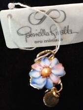 Ciondolo fiore oro 18 kt e