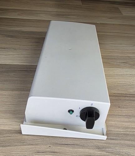 Alimentatore lampada fessura