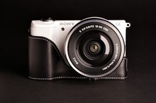 Custodia mezza fotocamera vera