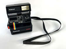 Macchina fotografica vintage Polaroid SUPERCOLOR 635CL striscia arcobaleno con cinturino non testata