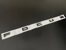 Distintivo scritta nero lucido