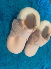 Scarpe culla Munchkin bordate
