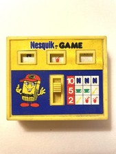 Gadget Nesquik Vintage:  Slot-Quik anni ‘80 giallo, funzionante, da collezione .
