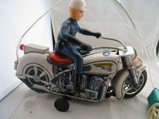 TM. modern toys masudaya, moto police filoguidata  battey
