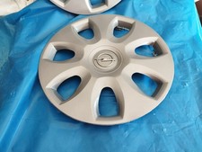 OPEL CORSA D 2006/2014 - SET 4 PZ. COPPA RUOTA BORCHIA COPRIRUOTA 15" C/LOGO CR.