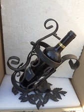 Porta bottiglia in ferro vintage  amaro Radis  della Stock. Marchio