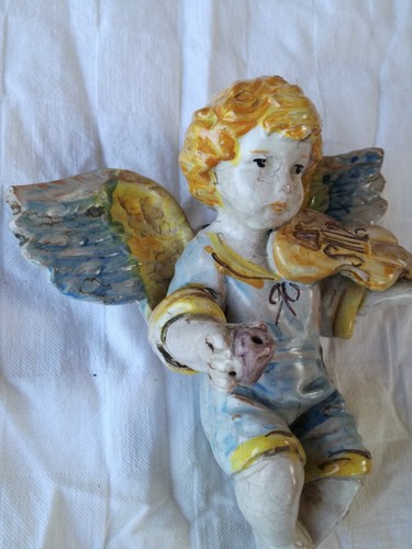 Scultura terracotta smaltata
