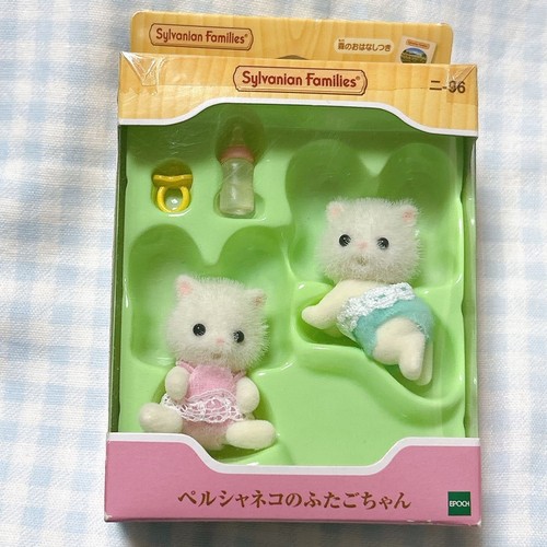 Gemelli gatti persiani