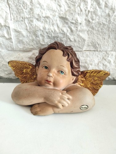 Statuina angelo putto