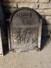 piastra ghisa camino usato. misura 34x46  2 pezzi vendibili anche separatamente 