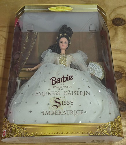 Barbie dans role de - le, als