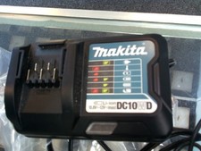 MAKITA CHARGER W/ 12V 2 BATTS