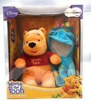 Peluche WINNIE THE POOH GIORNO E NOTTE ALTEZZA PELUCHE CIRCA 35 CM + 18 MESI