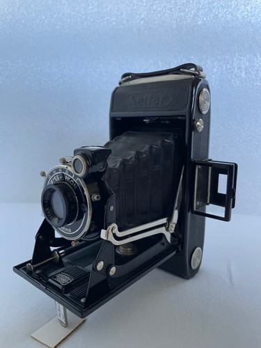 Macchina fotografica - , a