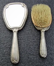 Specchio e spazzola vintage in argento"800".