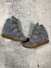 Sneakers con zeppa alta in