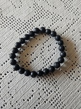 Braccialetto nero effetto pietre vulcaniche, unisex