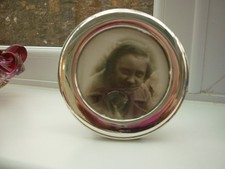 Cornice portafoto circolare in