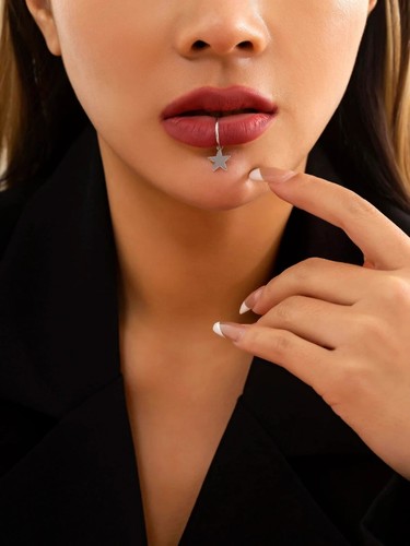 Piercing donna con stella - piercing,
