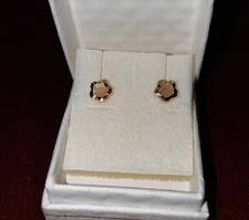 Orecchini fiore stilizzato oro giallo 18 kt