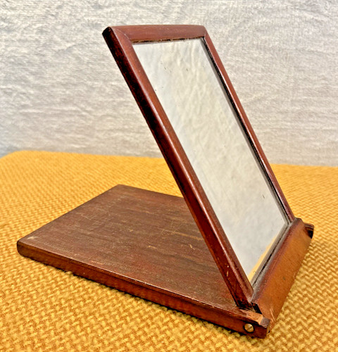 Antico specchio pieghevole