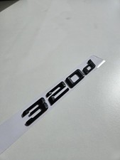 320d emblema nero opaco