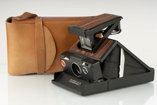 Polaroid SX-70 Alpha Model 3 - Reskinnata, testata e funzionante, vera pelle legno