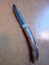 coltello a lama pieghevole in legno massello usato