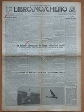 Newspaper Book and Musket 1932