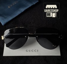 Occhiali da sole Gucci GG1220S nero e oro lenti nere spedizione lo stesso giorno
