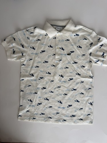 Polo lacoste bianca con aerei - lacoste,