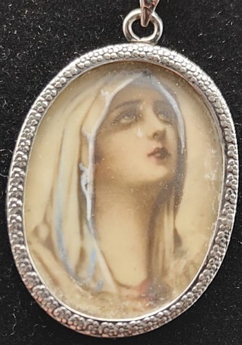 Madonnina dipinta ovale - in,