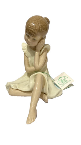 Hervit ballerina seduta