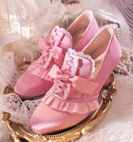 Fiocchi pizzo rosa decolte - in,