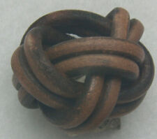 Woggel marrone scuro forma